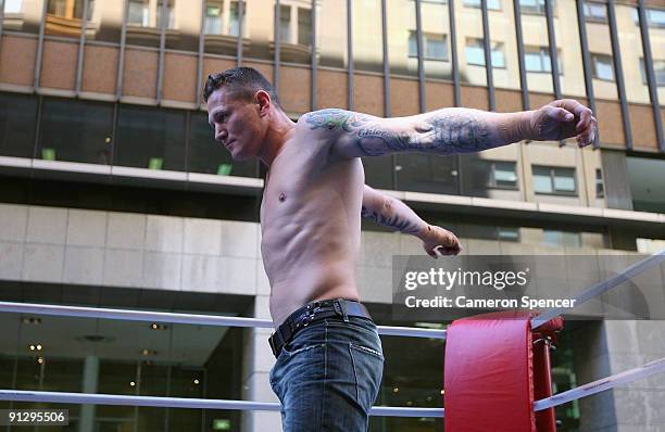 Boxer Danny Green warms up for a demonstration sparring session during a Danny Green Media Opportunity at Martin Place on October 1, 2009 in Sydney,...