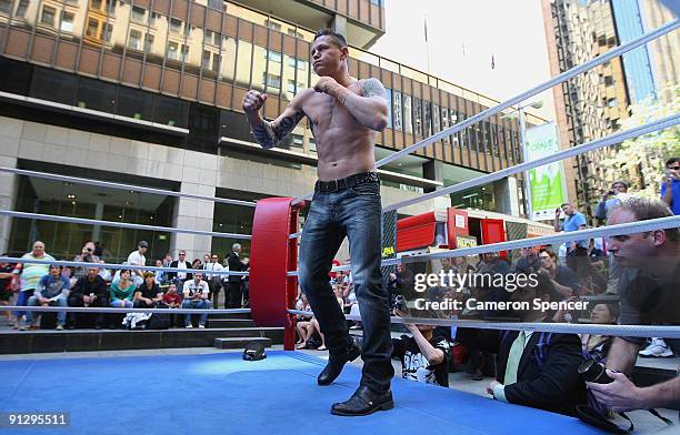 Boxer Danny Green warms up for a demonstration sparring session during a Danny Green Media Opportunity at Martin Place on October 1, 2009 in Sydney,...