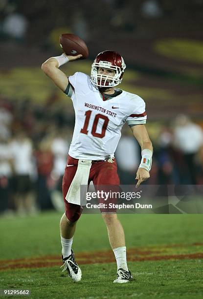 Quarterback Jeff Tuel of the Washington State Cougars throws a pass against the USC Trojans on September 23, 2009 at the Los Angeles Coliseum in Los...