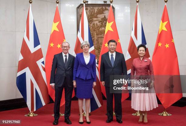 From left to right, Philip May, husband of U.K. Prime Minister Theresa May, Theresa May, U.K. Prime minister, Xi Jinping, China's president, and Peng...