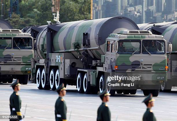 Nuclear-capable missiles are displayed at a massive parade to celebrate the 60th anniversary of the founding of the People's Republic of China on...