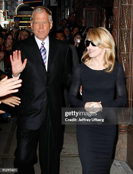 David Letterman and Madonna visit the ''Late Show with David Letterman'' at the Ed Sullivan Theater on September 30, 2009 in New York City.