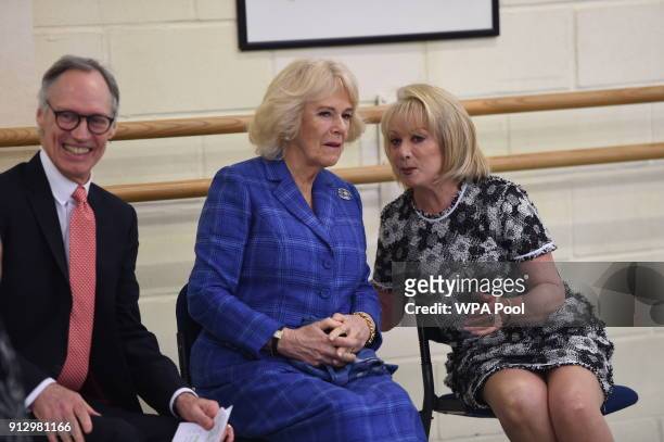 Camilla, Duchess of Cornwall speaks with Elaine Paige as she visits the Royal Academy of Dance to meet students and staff and learn about the Silver...