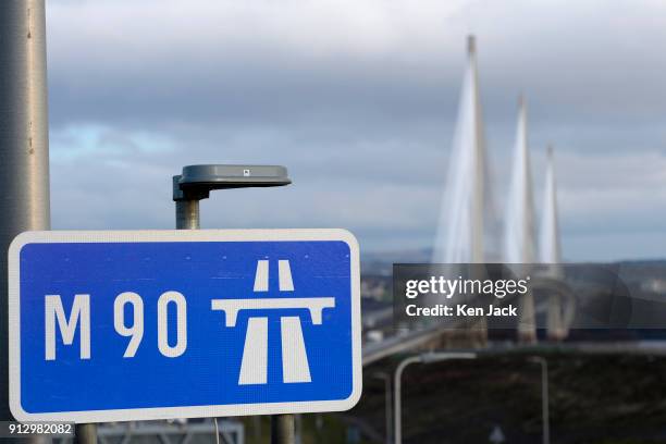 Motorway sign on the approach to the new Queensferry Crossing over the Forth Estuary as motorway regulations come into force, with public transport...