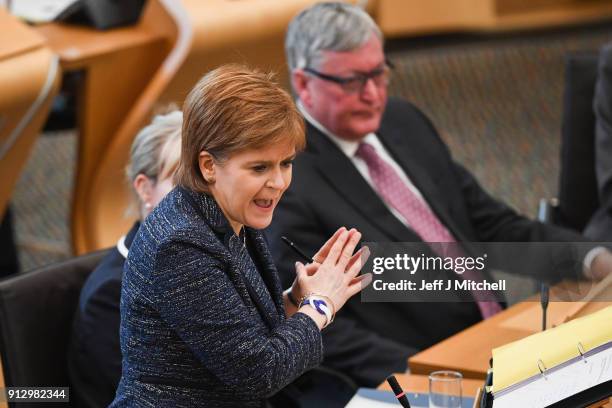 First Minister of Scotland Nicola Sturgeon answers questions during first ministers questions in the Scottish Parliament on February 1, 2018 in...