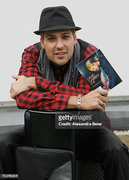 German violinist David Garrett smiles during a news conference to present his DVD 'David Garrett Live - in Concert & in Private' on October 1, 2009...