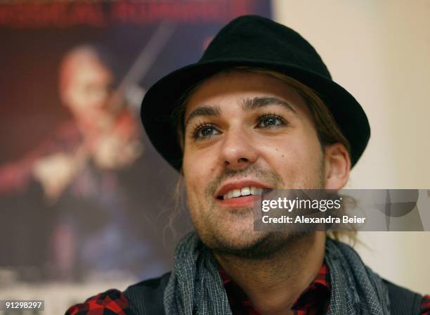 German violinist David Garrett smiles during a news conference to present his DVD 'David Garrett Live - in Concert & in Private' on October 1, 2009...