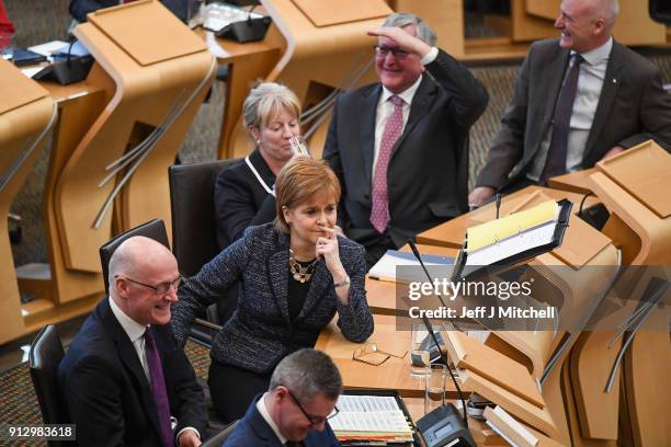 First Minister of Scotland Nicola Sturgeon answers questions during first ministers questions in the Scottish Parliament on February 1, 2018 in...