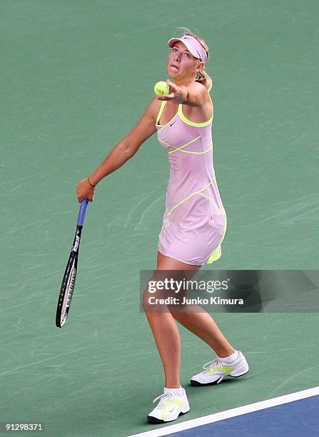 Maria Sharapova of Russia serves in her match against Iveta Benesova of the Czech Republic during day five of the Toray Pan Pacific Open Tennis...