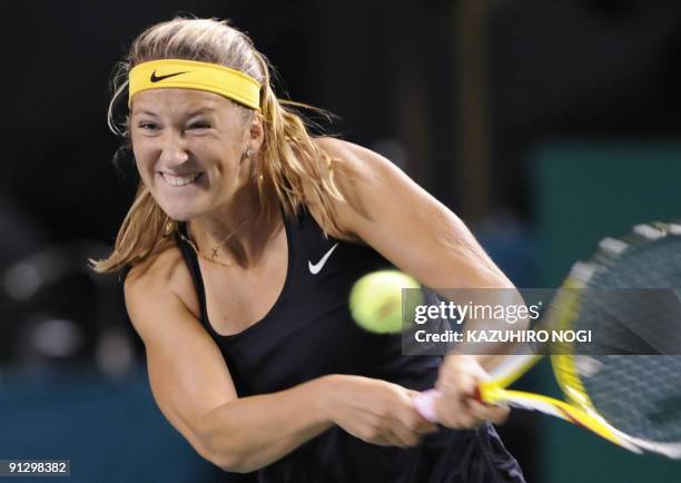 Victoria Azarenka of Belarus returns to Li Na of China during their women's singles quarter-final match in the Pan Pacific Open tennis tournament in...