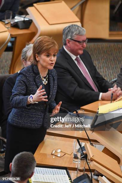 First Minister of Scotland Nicola Sturgeon answers questions during first ministers questions in the Scottish Parliament on February 1, 2018 in...