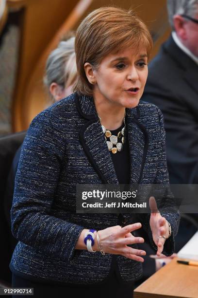 First Minister of Scotland Nicola Sturgeon answers questions during first ministers questions in the Scottish Parliament on February 1, 2018 in...