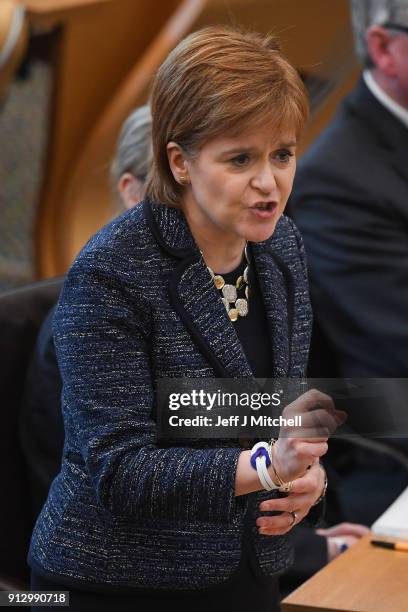 First Minister of Scotland Nicola Sturgeon answers questions during first ministers questions in the Scottish Parliament on February 1, 2018 in...