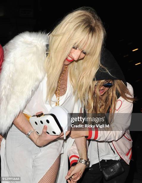 Nick Grimshaw and Kate Moss attend the Death Of A Geisha VIP Halloween Party on November 1, 2014 in London, England.
