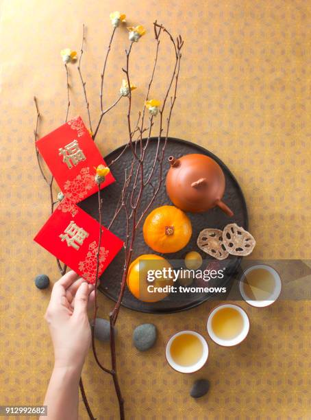 flat lay chinese new year food and drink still life. - lunar new year cup 2017 stock-fotos und bilder