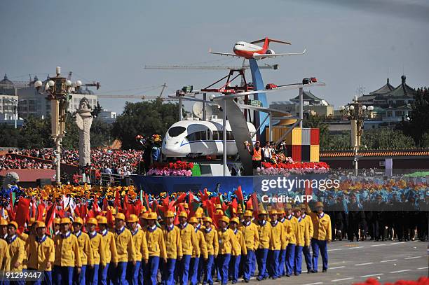 Float representing modes of transport passes by Tiananmen Square during the National Day parade in Beijing on October 1, 2009. China celebrated 60...