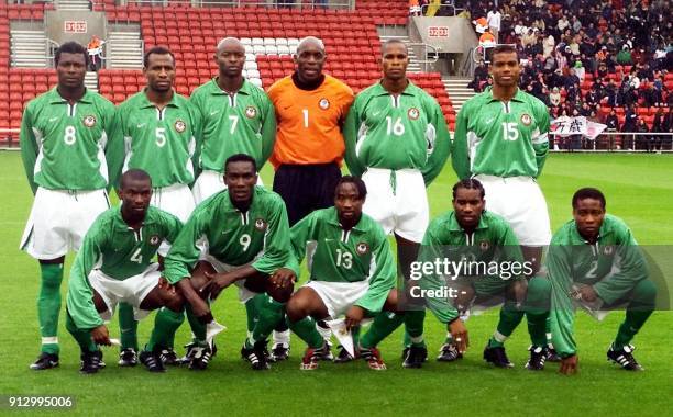 Nigerian national soccer team players pose for a group picture 07 October 2001 in Southampton before the start of their friendly match against Japan...