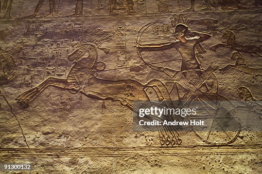 Wall relief carving of Ramses II in his chariot