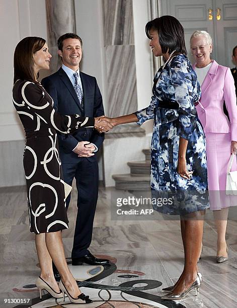 Danish Crown Princess Mary , Crown Prince Frederik and Queen Margrethe welcome US First Lady Michelle Obama at Amalienborg Castle in Copenhagen on...
