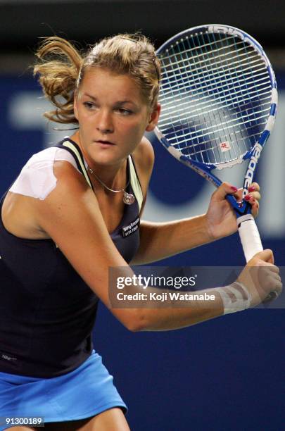 Agnieszka Radwanska of Poland looks on in her match against Magdalena Rybarikova of Slovakia during day five of the Toray Pan Pacific Open Tennis...