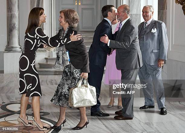 Danish Crown Princess Mary welcomes Spanish Queen Sofia at Amalienborg Castle in Copenhagen on October 1 as Crown Prince Frederik , Queen Margrethe ,...