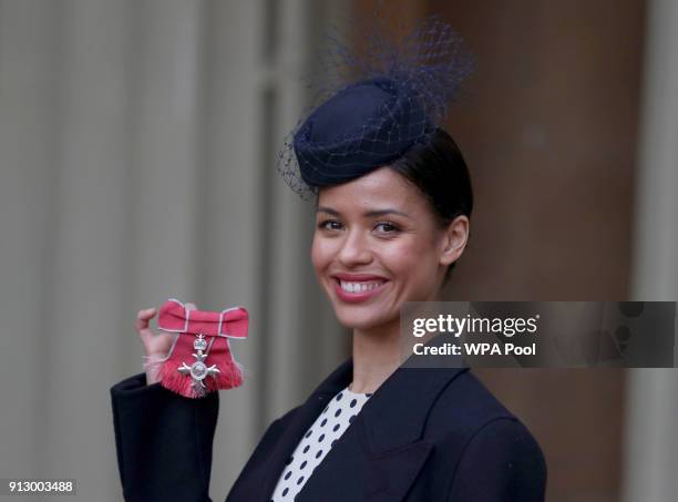 Doctor Who actress Gugulethu Mbatha-Raw after she was awarded an MBE by the Prince of Wales during an Investiture ceremony at Buckingham Palace on...
