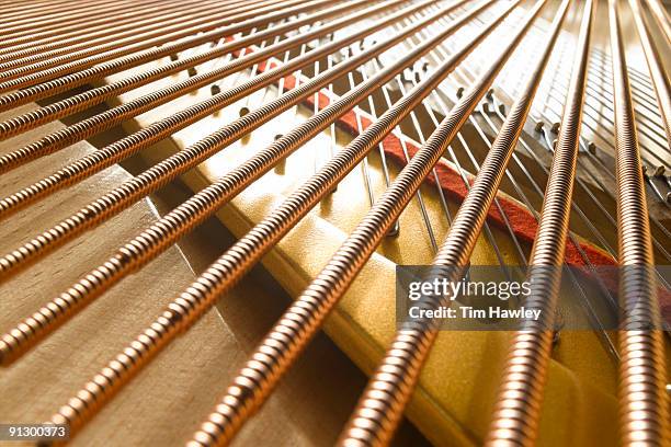 strings inside grand piano - musical instrument string stock pictures, royalty-free photos & images