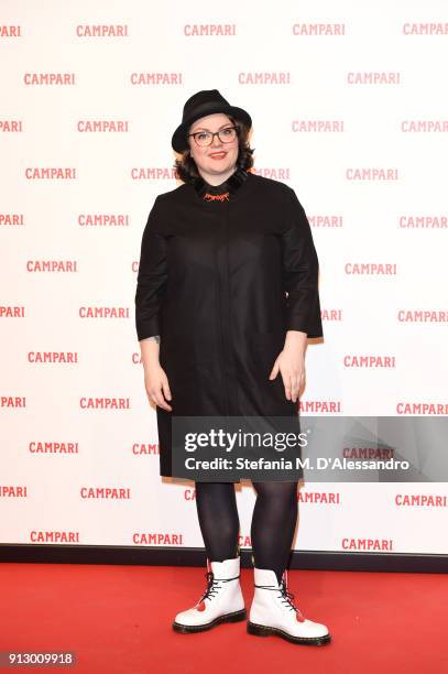 The bartender Marie Rausch star of 'The Legend of Red Hand' short movie walk the red carpet on January 30, 2018 in Milan, Italy.