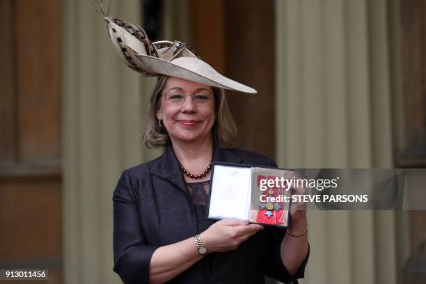 Chief Executive, Sport England Jennifer Price poses with her medal after she was appointed a Commander of the Order of the British Empire for...