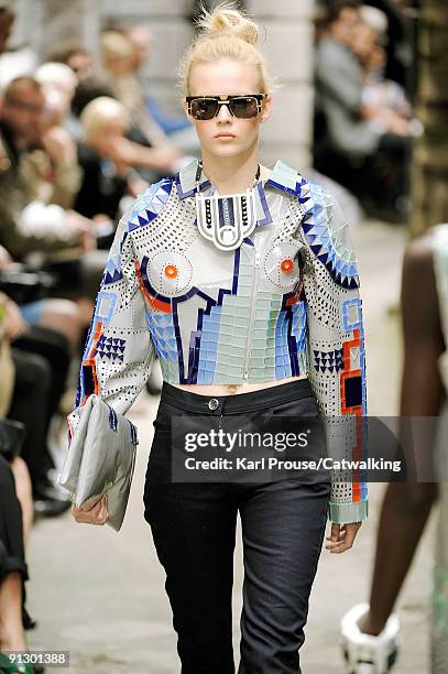 Model walks down the catwalk during the Holly Fulton fashion show as part of London Fashion Week on September 22, 2009 in London, England.