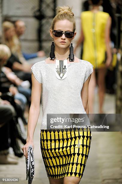 Model walks down the catwalk during the Holly Fulton fashion show as part of London Fashion Week on September 22, 2009 in London, England.