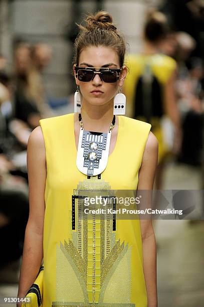 Model walks down the catwalk during the Holly Fulton fashion show as part of London Fashion Week on September 22, 2009 in London, England.