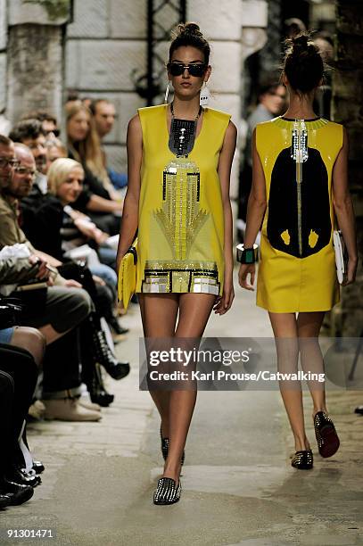 Model walks down the catwalk during the Holly Fulton fashion show as part of London Fashion Week on September 22, 2009 in London, England.