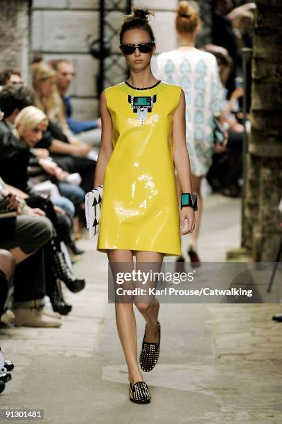 Model walks down the catwalk during the Holly Fulton fashion show as part of London Fashion Week on September 22, 2009 in London, England.