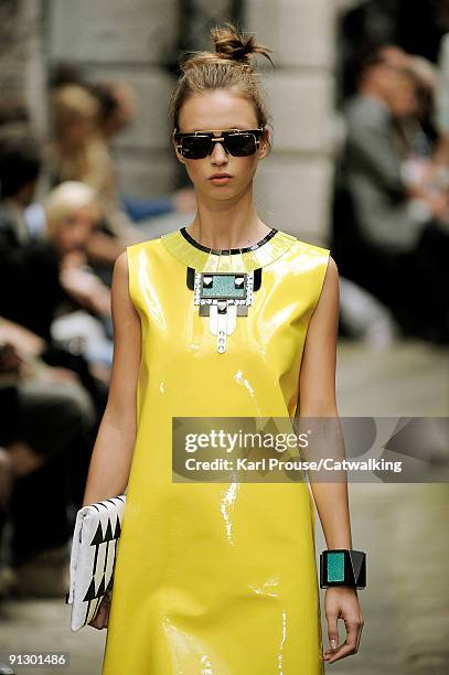 Model walks down the catwalk during the Holly Fulton fashion show as part of London Fashion Week on September 22, 2009 in London, England.