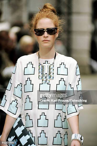 Model walks down the catwalk during the Holly Fulton fashion show as part of London Fashion Week on September 22, 2009 in London, England.