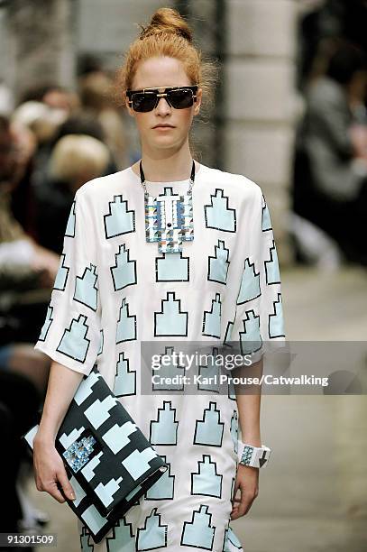 Model walks down the catwalk during the Holly Fulton fashion show as part of London Fashion Week on September 22, 2009 in London, England.