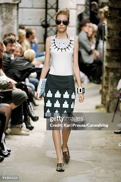 Model walks down the catwalk during the Holly Fulton fashion show as part of London Fashion Week on September 22, 2009 in London, England.