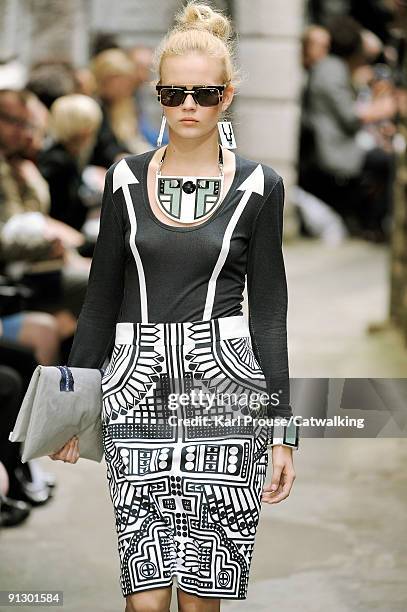 Model walks down the catwalk during the Holly Fulton fashion show as part of London Fashion Week on September 22, 2009 in London, England.