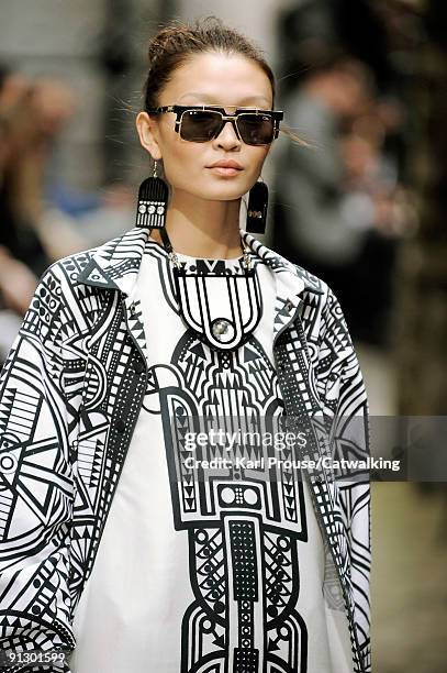 Model walks down the catwalk during the Holly Fulton fashion show as part of London Fashion Week on September 22, 2009 in London, England.