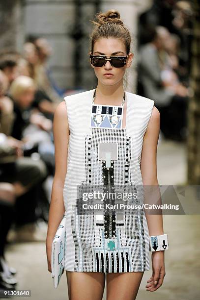 Model walks down the catwalk during the Holly Fulton fashion show as part of London Fashion Week on September 22, 2009 in London, England.