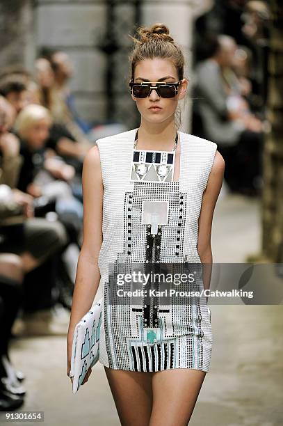 Model walks down the catwalk during the Holly Fulton fashion show as part of London Fashion Week on September 22, 2009 in London, England.