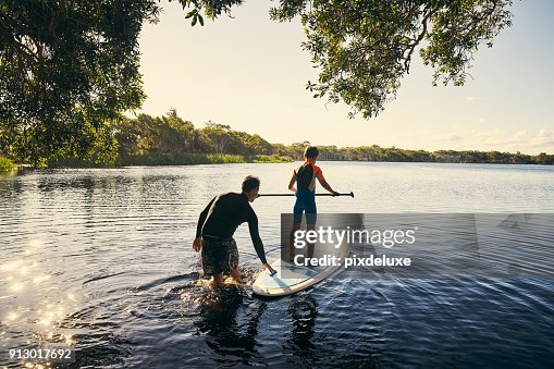 Teaching my boy how to paddle Teaching my boy how to paddle