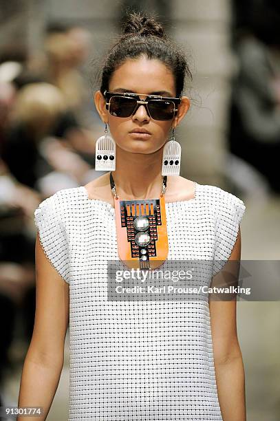 Model walks down the catwalk during the Holly Fulton fashion show as part of London Fashion Week on September 22, 2009 in London, England.