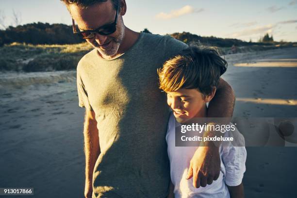 no love is greater than a father for his son - father sun stock pictures, royalty-free photos & images