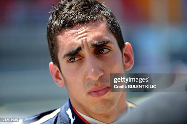 Toro Rosso's Swiss driver Sebatian Buemi kis pictured in the pits of the Istanbul Park circuit on June 6, 2009 in Istanbul, after the third free...