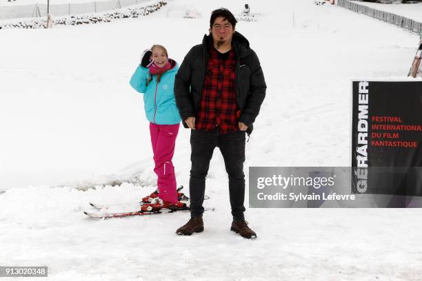 Young anonymous skier waves behind director Paul Urkijo as he attends the 25th Gerardmer Fantastic Film Festival on February 1, 2018 in Gerardmer,...