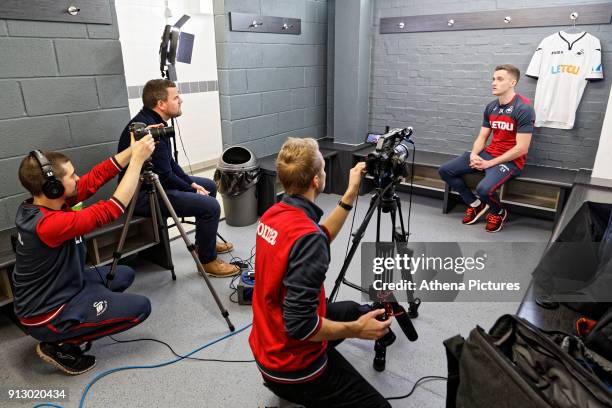 Andy King speaks to the club's media team as he is unveiled as a new Swansea City signing at The Fairwood Training Ground on February 01, 2018 in...