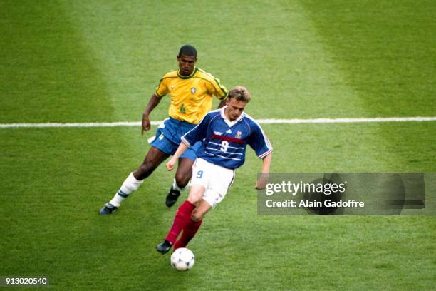 Stephane GUIVARC'H of France and Junior Baiano of Brazil during the Soccer World Cup Final between Brazil and France on July 12 1998 in Paris Saint...