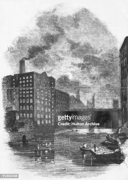 Factories on the River Irwell in the city of Manchester, circa 1850.